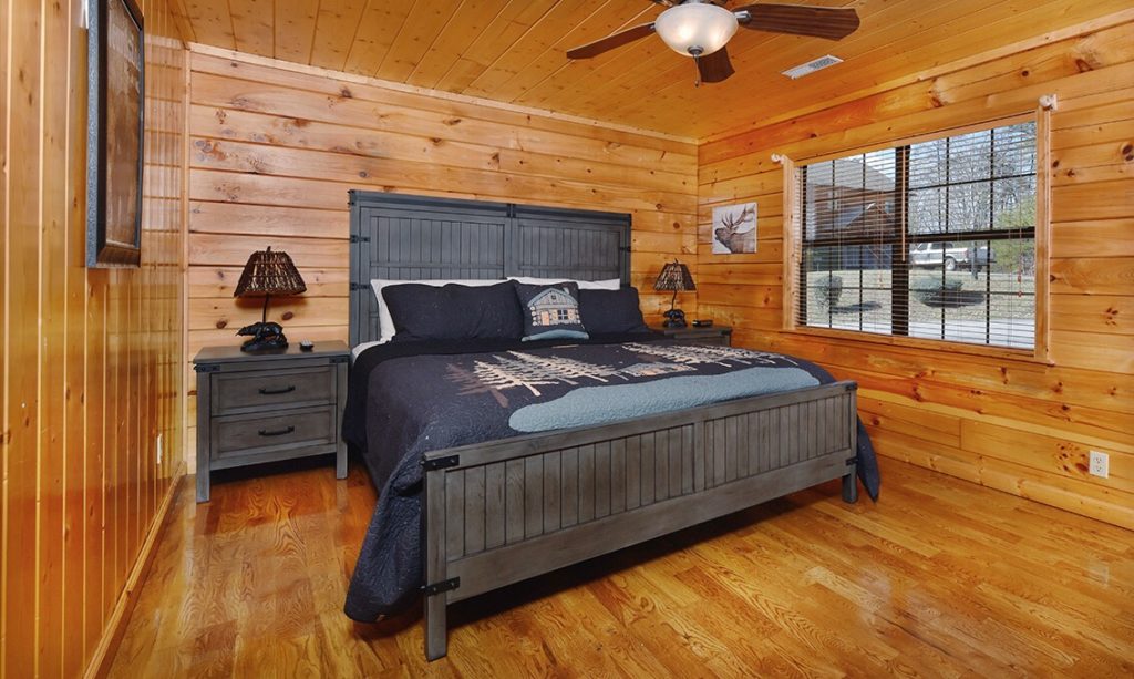 A bedroom in the luxurious cabin yoga retreat led by Dana Taft teacher author pastor from Nashville in the Smoky Mountains