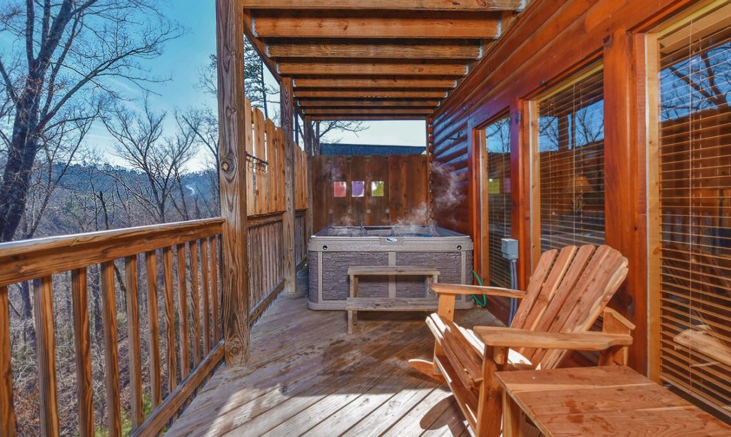 Mountain view of Smokies and hot tub in the luxurious cabin yoga retreat led by Dana Taft teacher author pastor from Nashville in the Smoky Mountains